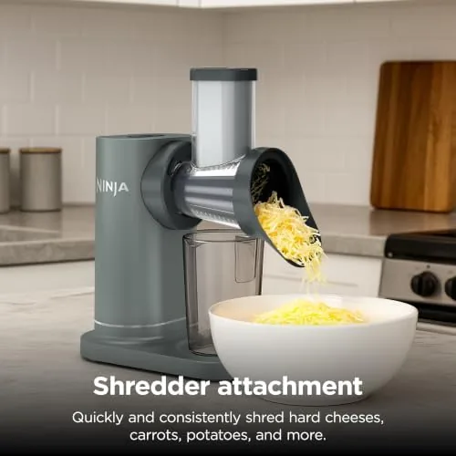 The auger assembly showing the continuous feed design and pulp outlet