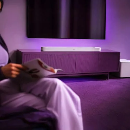 A movie scene playing on the television while the Bose system delivers sound