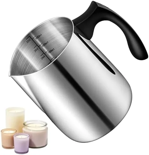 The 32 oz stainless steel candle pouring pot with wax being poured into a jar