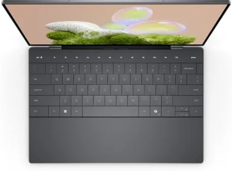 person working on the Dell XPS 13 laptop