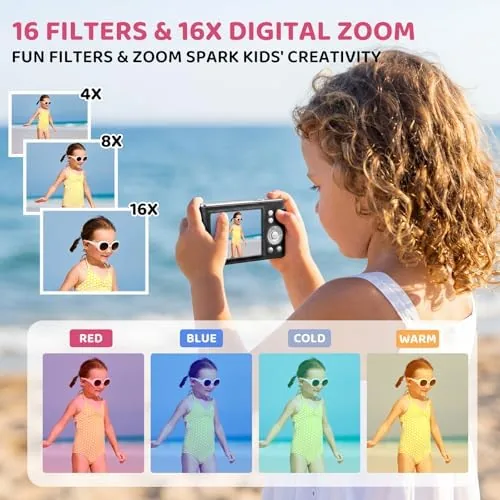 The camera held in a child hand during an outdoor photo session