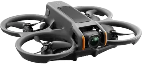 The FPV goggles feed showing a low flight over a field with the HDR view