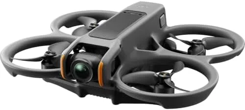 The Avata 2 flying low over a field with the landing pad visible below